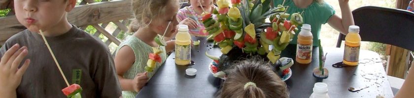 Kids eating fruit turtle